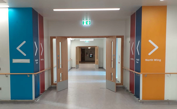 Healthcare corridor with swing timber double doorsets