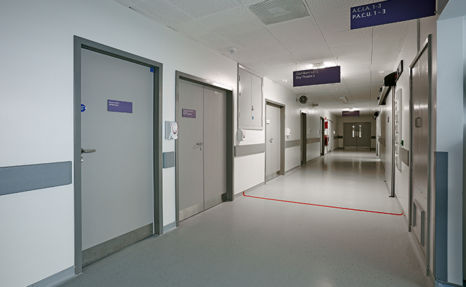 A hospital corridor with Lead-Lined X-Ray Doors