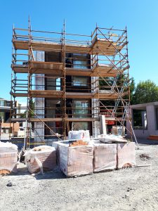 Prototypes of bespoke glazing system and surrounding brick facade being constructed in Kill Co Kildare
