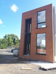 Prototype of completely bespoke glazing system and surrounding brick facade built in Kill Co Kildare