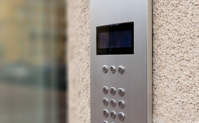 audio video intercom provides security barrier access to multiple occupancy building