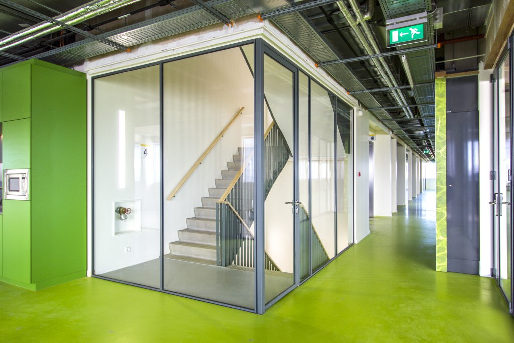 Glazed-screens-and-integrated-door-surrounds-main-stairwell-of-building. Part of KCC's Glass Internal Walls range.