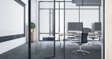 Slim-black-frame-glass-wall-into-modern-office