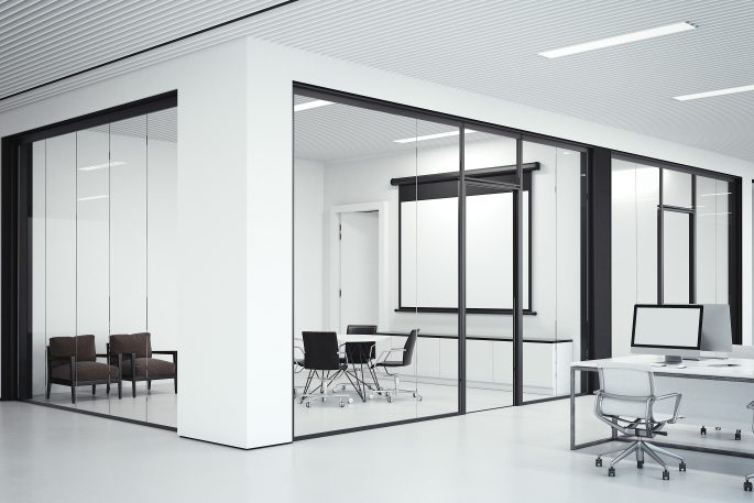 Modern-office-with-minimalist-slim-frame-glass-walls-and-integrated-doors-