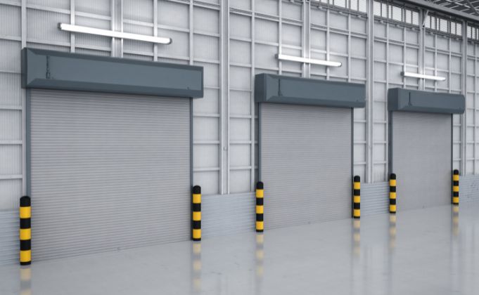 https://thekccgroup.com/wp-content/uploads/2022/09/industrial-high-performance-steel-roller-shutter-doors.jpg