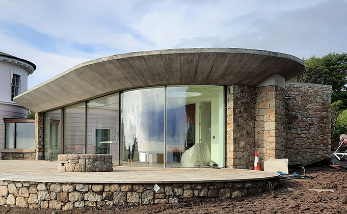 Curved glass sliding door on private residential property