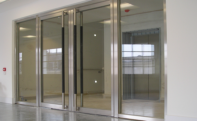 Double fire rated glass doors with full length pull handles