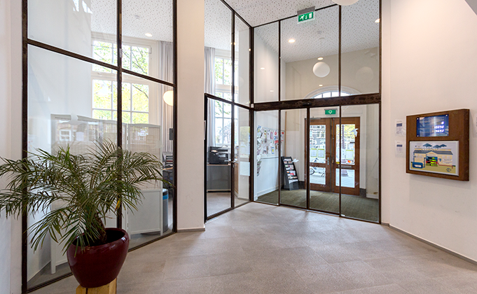 Fire rated glass doors with extra height glass panels above