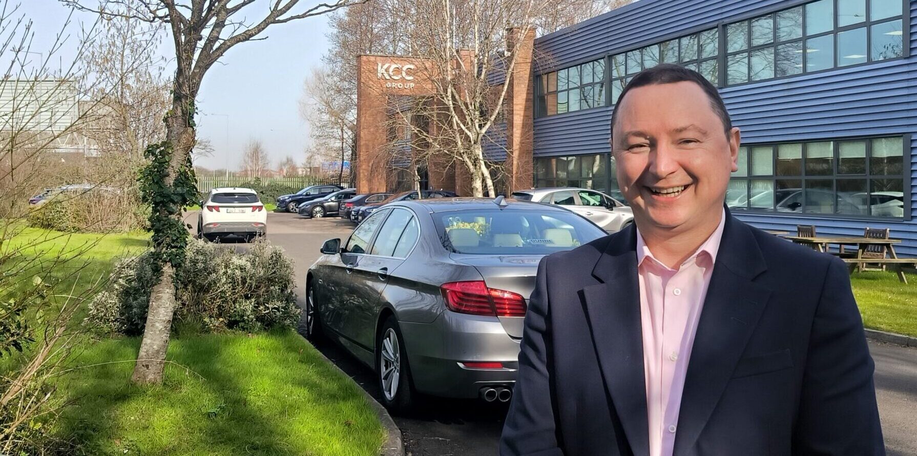 A picture of Alan Murphy, general manager for Service in KCC Group smiling standing outside the headquarters in Ballymount Dublin